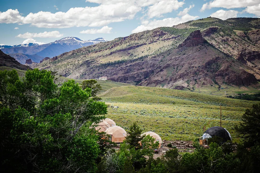 Lodging domes with mountain scenery